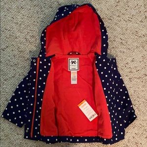 Adorable navy blue polkadot jacket.